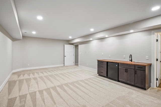 1705 Horseshoe Rd, Delaware, OH 43015 - finished basement with light carpet, refrigerator, recessed lighting, and wet bar