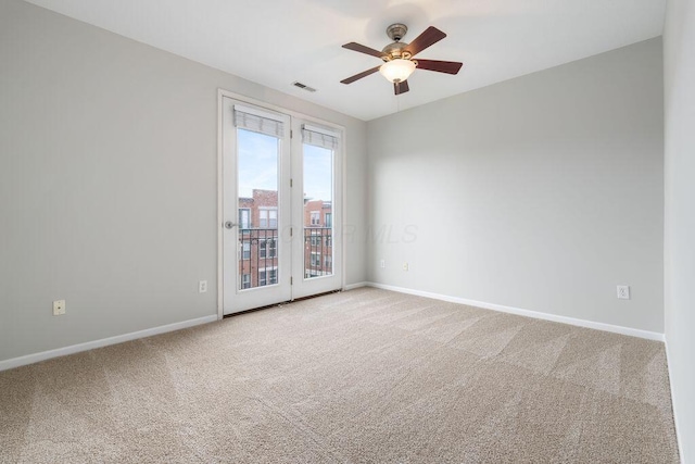 121 E Noble St Unit 3, Columbus, OH 43215 - empty room featuring carpet flooring and a ceiling fan