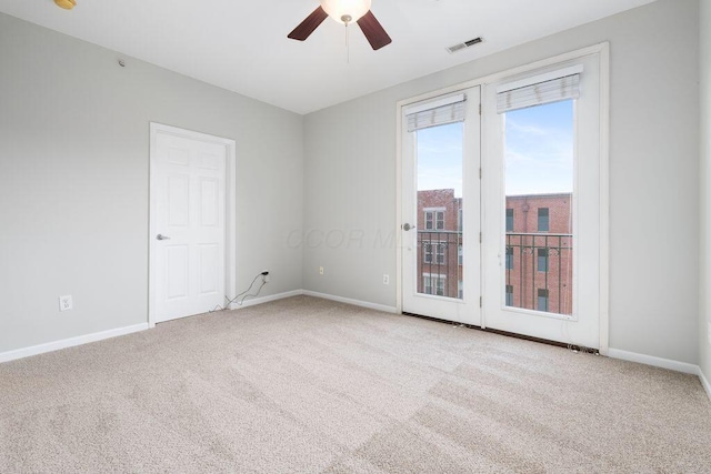121 E Noble St Unit 3, Columbus, OH 43215 - carpeted empty room with ceiling fan and baseboards