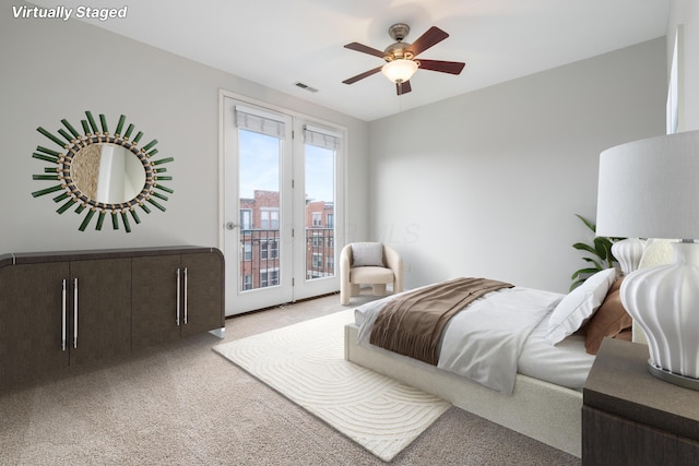 121 E Noble St Unit 3, Columbus, OH 43215 - bedroom featuring access to outside, carpet, and ceiling fan