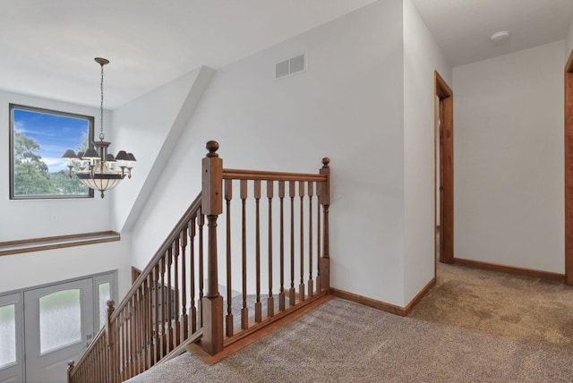 2680 Biers Run Rd, Chillicothe, OH 45601 - stairs featuring a chandelier and carpet floors
