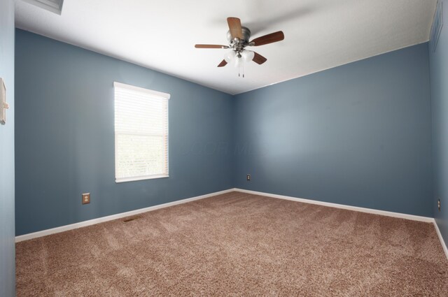 337 Masonglen Ct, Pataskala, OH 43062 - carpeted spare room with ceiling fan and baseboards