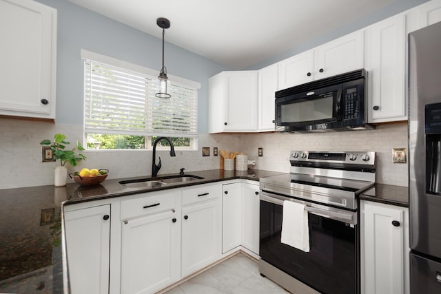337 Masonglen Ct, Pataskala, OH 43062 - kitchen with appliances with stainless steel finishes, white cabinets, tasteful backsplash, and hanging light fixtures