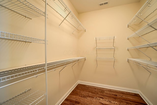 5428 Tathwell Dr, New Albany, OH 43054 - walk in closet with wood finished floors