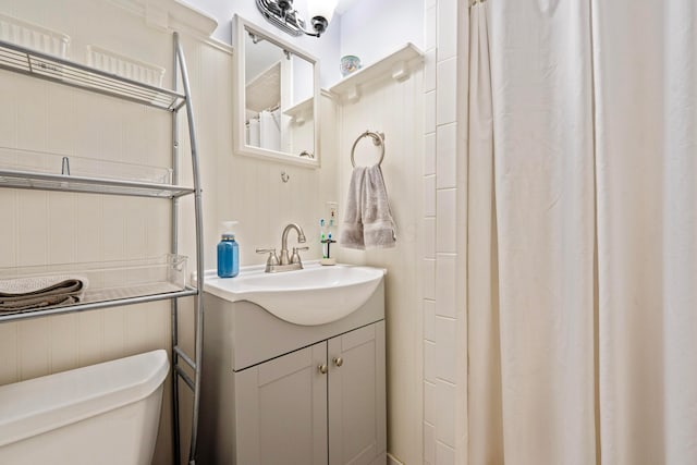 582 E Stanton Ave, Columbus, OH 43214 - full bathroom featuring vanity and a shower with shower curtain