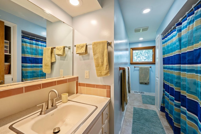582 E Stanton Ave, Columbus, OH 43214 - bathroom with vanity, recessed lighting, tile patterned flooring, and curtained shower