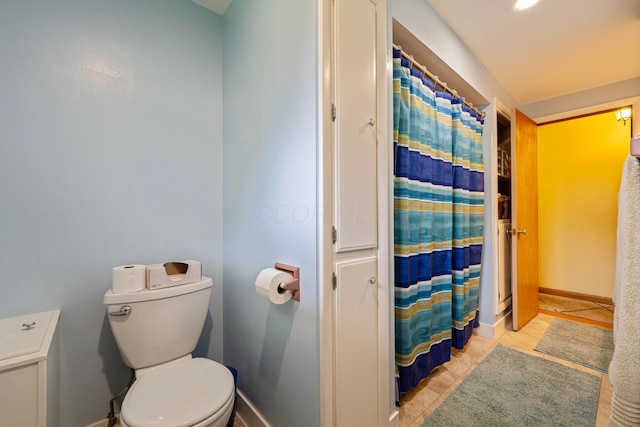582 E Stanton Ave, Columbus, OH 43214 - full bath featuring a shower with shower curtain, tile patterned flooring, and recessed lighting