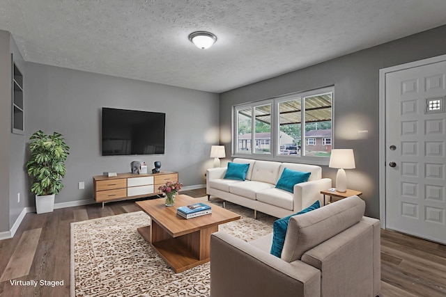 2103 Rochelle Pl, Columbus, OH 43232 - living area featuring wood finished floors and a textured ceiling