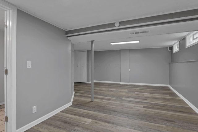 2103 Rochelle Pl, Columbus, OH 43232 - below grade area with baseboards and wood finished floors
