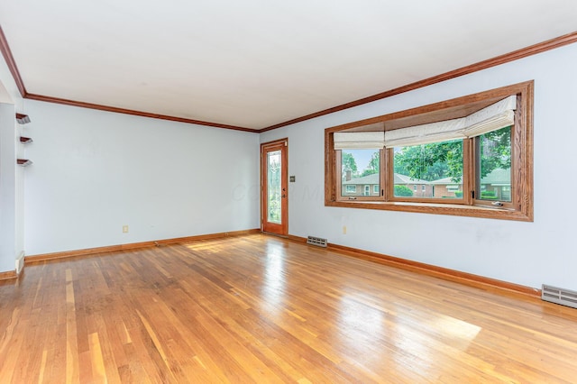 4453 Marland Dr, Columbus, OH 43224 - unfurnished room featuring light wood-style flooring and ornamental molding