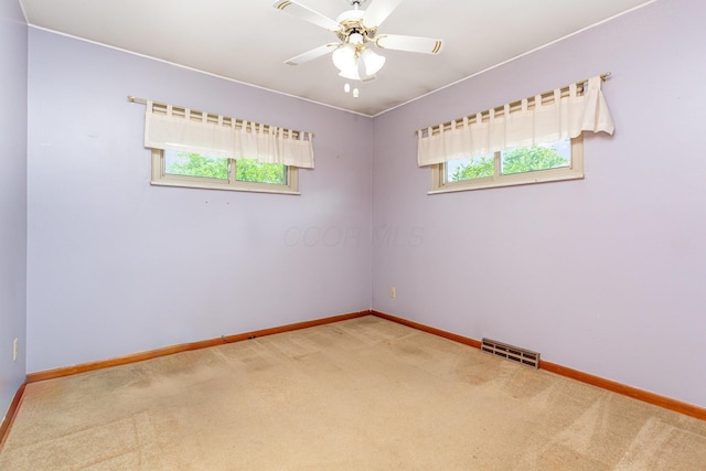 4453 Marland Dr, Columbus, OH 43224 - spare room with carpet and ceiling fan