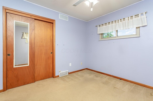 4453 Marland Dr, Columbus, OH 43224 - empty room with carpet floors and a ceiling fan
