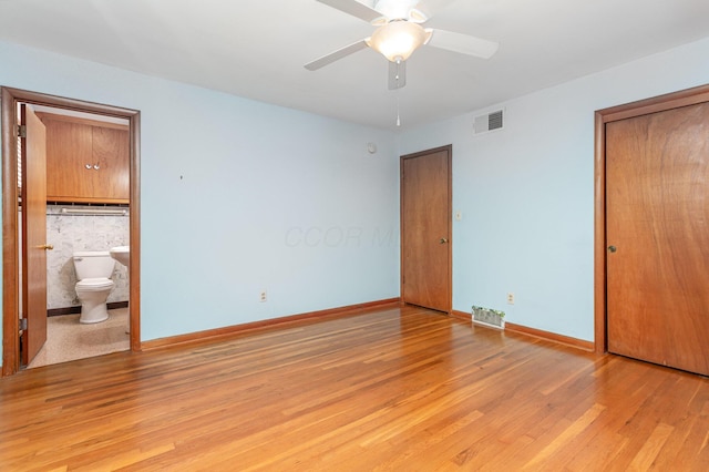 4453 Marland Dr, Columbus, OH 43224 - unfurnished bedroom featuring light wood-style floors and connected bathroom