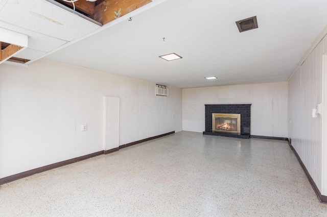 4453 Marland Dr, Columbus, OH 43224 - basement featuring a brick fireplace and baseboards