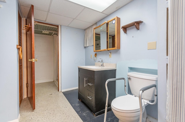 4453 Marland Dr, Columbus, OH 43224 - bathroom featuring vanity, a drop ceiling, and a shower
