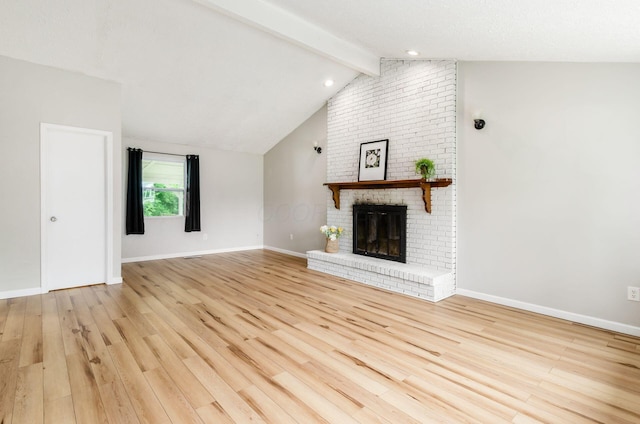 3623 Bolamo Dr, Westerville, OH 43081 - unfurnished living room with wood finished floors, a brick fireplace, and recessed lighting