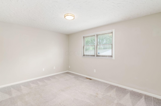 3623 Bolamo Dr, Westerville, OH 43081 - spare room with carpet and a textured ceiling