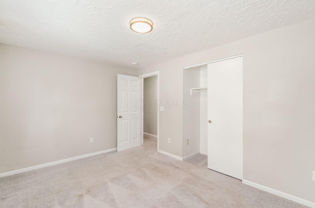 3623 Bolamo Dr, Westerville, OH 43081 - unfurnished bedroom with carpet flooring, a closet, and a textured ceiling