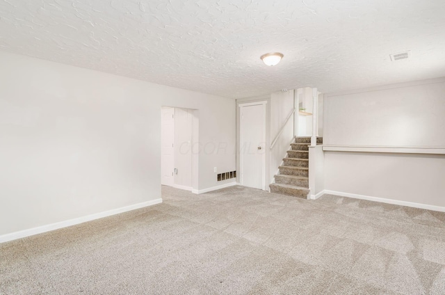 3623 Bolamo Dr, Westerville, OH 43081 - spare room with carpet flooring, stairway, and a textured ceiling
