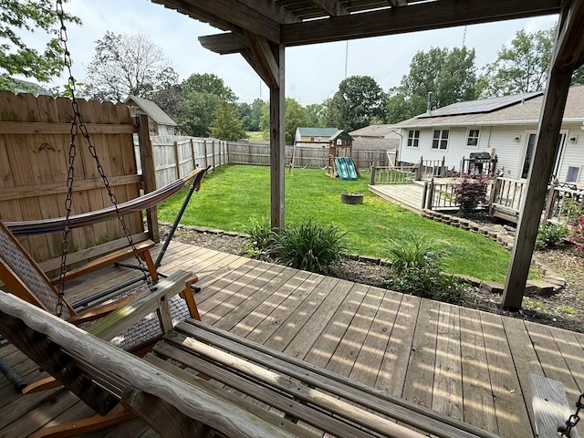 1819 Walnut Rd, Heath, OH 43056 - wooden deck with a playground and a fenced backyard