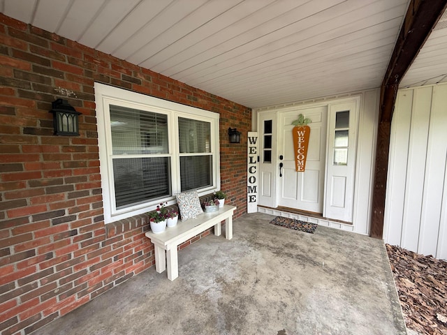 1819 Walnut Rd, Heath, OH 43056 - doorway to property with covered porch and brick siding