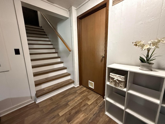 1819 Walnut Rd, Heath, OH 43056 - stairway featuring wood finished floors