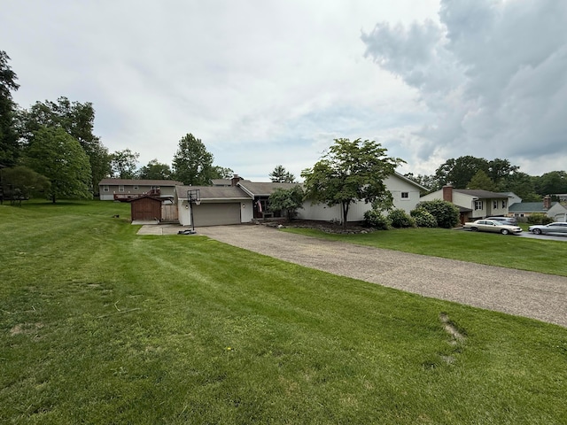 1819 Walnut Rd, Heath, OH 43056 - view of front facade featuring an attached garage, a front yard, and asphalt driveway