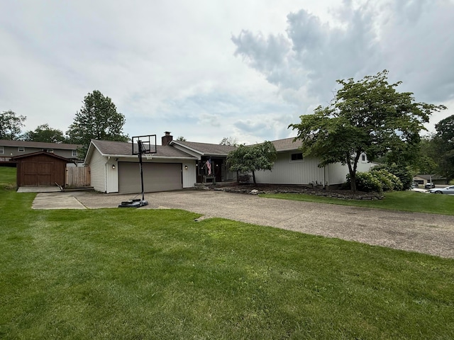 1819 Walnut Rd, Heath, OH 43056 - view of front facade with a garage, a front yard, driveway, a chimney, and a storage shed