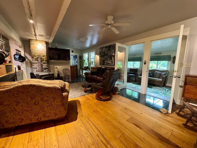 6598 Jeff Ln, Athens, OH 45701 - living room with ceiling fan, wood-type flooring, healthy amount of natural light, and vaulted ceiling