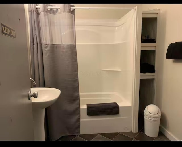 6598 Jeff Ln, Athens, OH 45701 - full bathroom with tile patterned floors and shower / tub combo