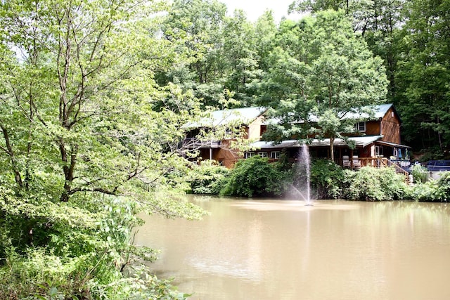 6598 Jeff Ln, Athens, OH 45701 - water view with a heavily wooded area
