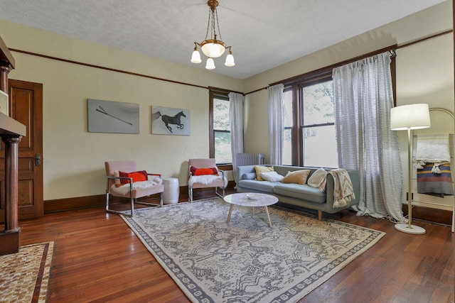 300 E Main St, Somerset, OH 43783 - living room with dark wood-style floors and baseboards