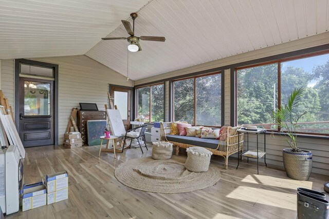 300 E Main St, Somerset, OH 43783 - sunroom featuring plenty of natural light, a deck, wood finished floors, wooden walls, and vaulted ceiling