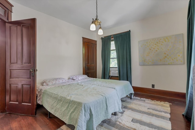 300 E Main St, Somerset, OH 43783 - bedroom with hardwood / wood-style floors and cooling unit