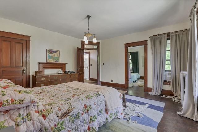 300 E Main St, Somerset, OH 43783 - bedroom with wood finished floors and cooling unit