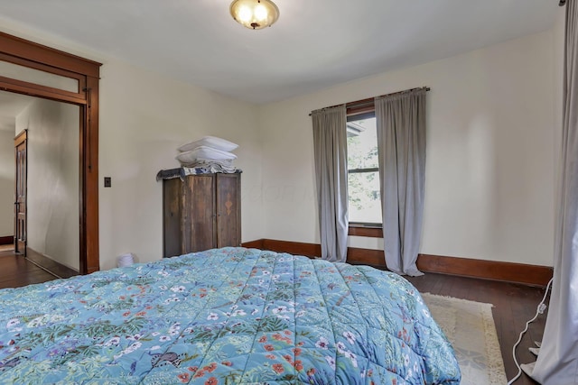 300 E Main St, Somerset, OH 43783 - bedroom featuring baseboards and wood finished floors