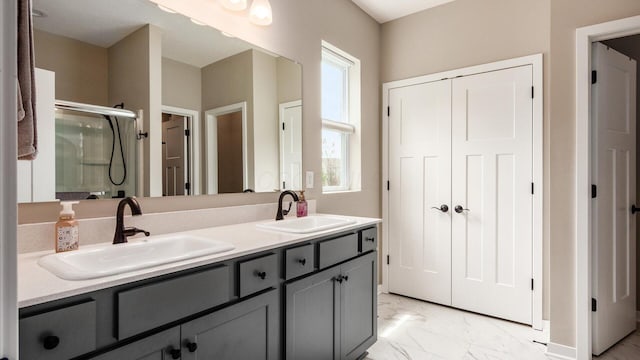 7087 Ribault Dr NW, Pickerington, OH 43147 - full bathroom with marble finish floors, double vanity, and a stall shower