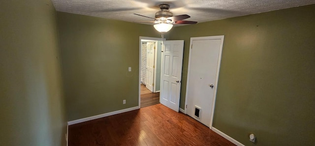 7358 Roshon Ave, Reynoldsburg, OH 43068 - unfurnished bedroom featuring a textured ceiling, wood finished floors, and ceiling fan
