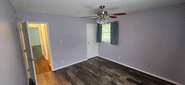 7358 Roshon Ave, Reynoldsburg, OH 43068 - spare room with a ceiling fan, dark wood-style floors, and a textured ceiling