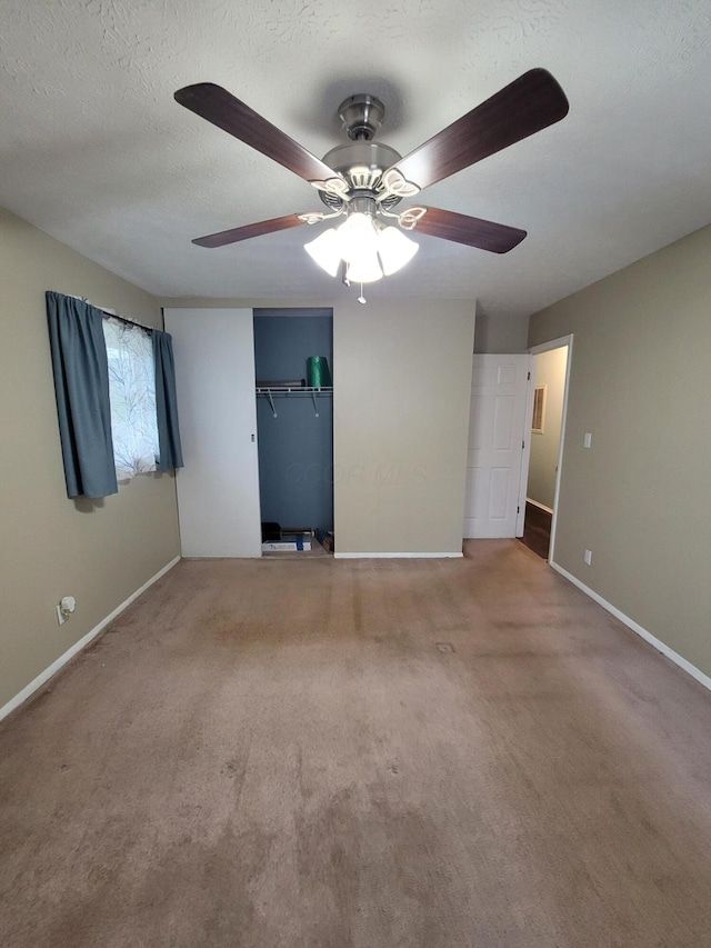 7358 Roshon Ave, Reynoldsburg, OH 43068 - empty room featuring carpet flooring, ceiling fan, and a textured ceiling