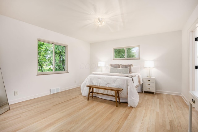 2841 Doncaster Rd, Upper Arlington, OH 43221 - bedroom featuring light wood finished floors and multiple windows