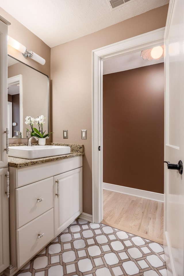2841 Doncaster Rd, Upper Arlington, OH 43221 - bathroom with tile patterned floors and vanity