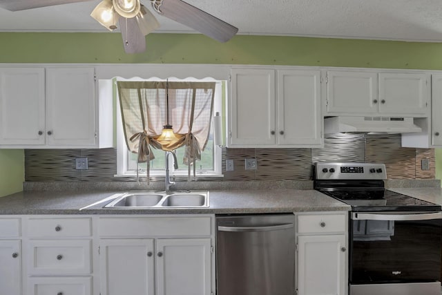 6605 Lancaster Rd SE, Hebron, OH 43025 - kitchen featuring appliances with stainless steel finishes, under cabinet range hood, white cabinets, and a textured ceiling