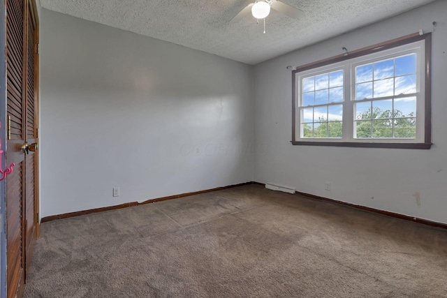 6605 Lancaster Rd SE, Hebron, OH 43025 - unfurnished room featuring carpet flooring, a textured ceiling, and ceiling fan