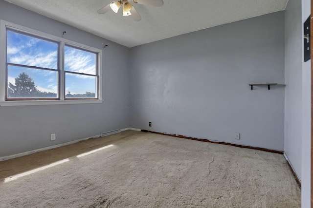 6605 Lancaster Rd SE, Hebron, OH 43025 - carpeted empty room with ceiling fan and a textured ceiling