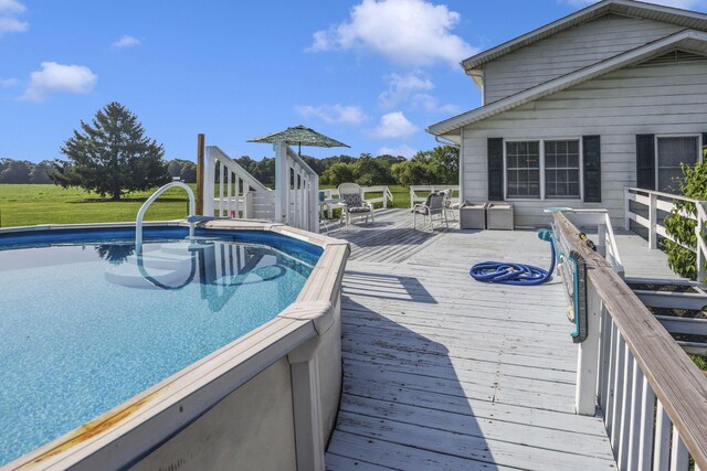 6605 Lancaster Rd SE, Hebron, OH 43025 - view of pool with a wooden deck