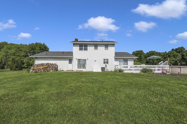 6605 Lancaster Rd SE, Hebron, OH 43025 - rear view of house featuring a lawn and a chimney