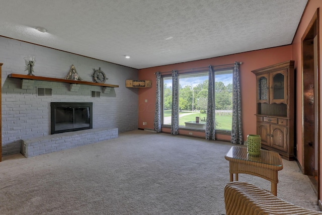 6605 Lancaster Rd SE, Hebron, OH 43025 - living area featuring a brick fireplace, carpet flooring, and a textured ceiling
