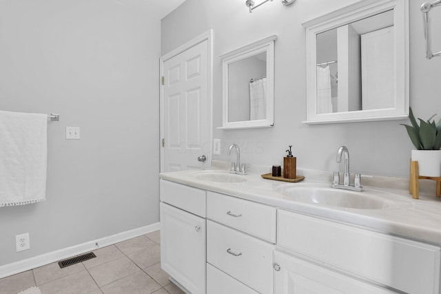 2635 Main St, Powell, OH 43065 - bathroom featuring double vanity and tile patterned floors