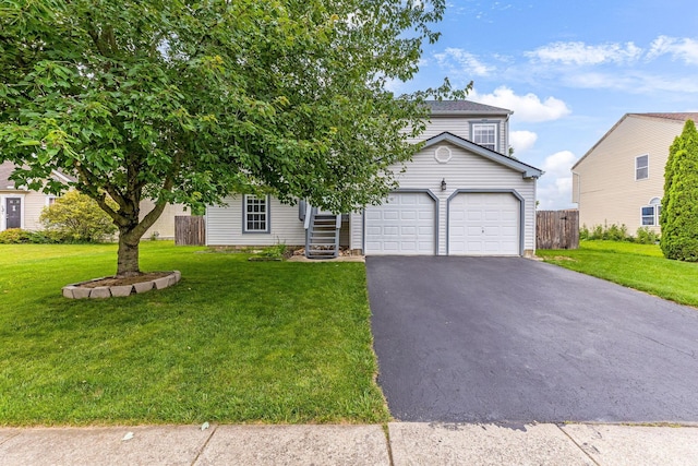 5733 Canal Bridge Dr, Canal Winchester, OH 43110 - view of front of property with asphalt driveway and a garage
